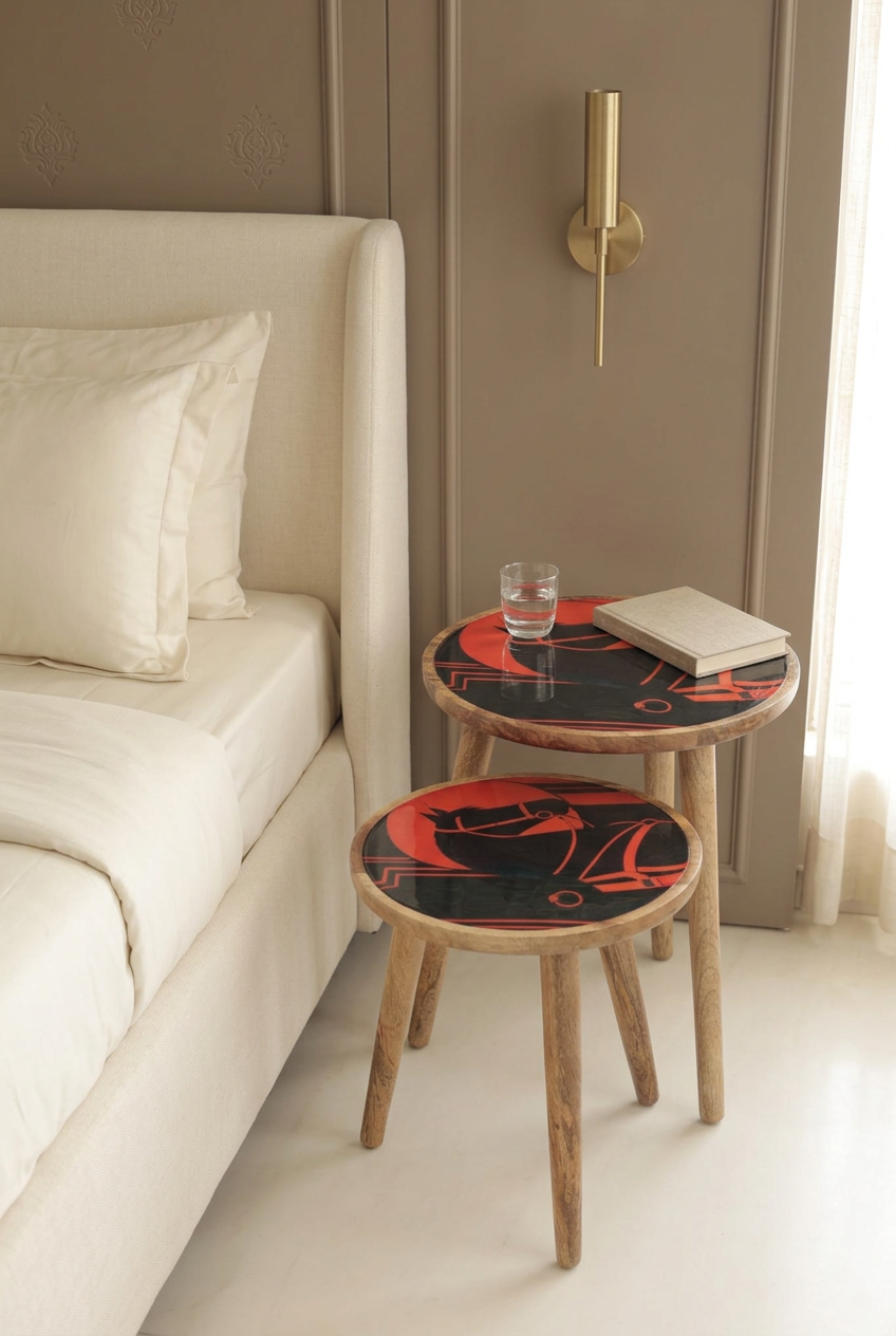Orange Horse printed wooden nesting side tables, set of two, styled beside a bed in a luxury bedroom